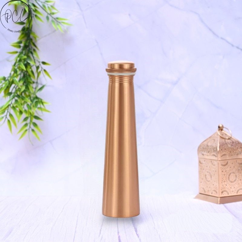 Pure copper water bottle with a matte finish, 1000 ML capacity, leak-proof design, by SAMA Homes.