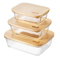 Set of three Igluu Meal Prep glass containers with bamboo lids in assorted sizes for storing and organizing meals.