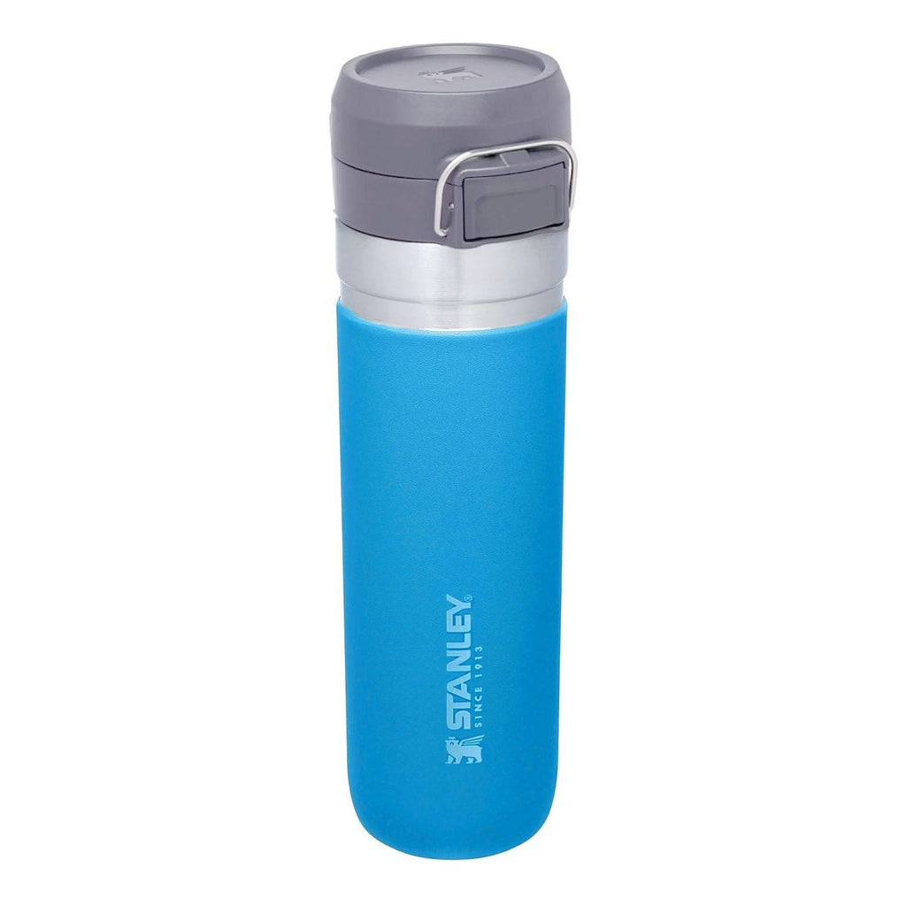 Stanley Quick Flip 0.7L water bottle with flip-top lid and durable stainless steel body for outdoor hydration.