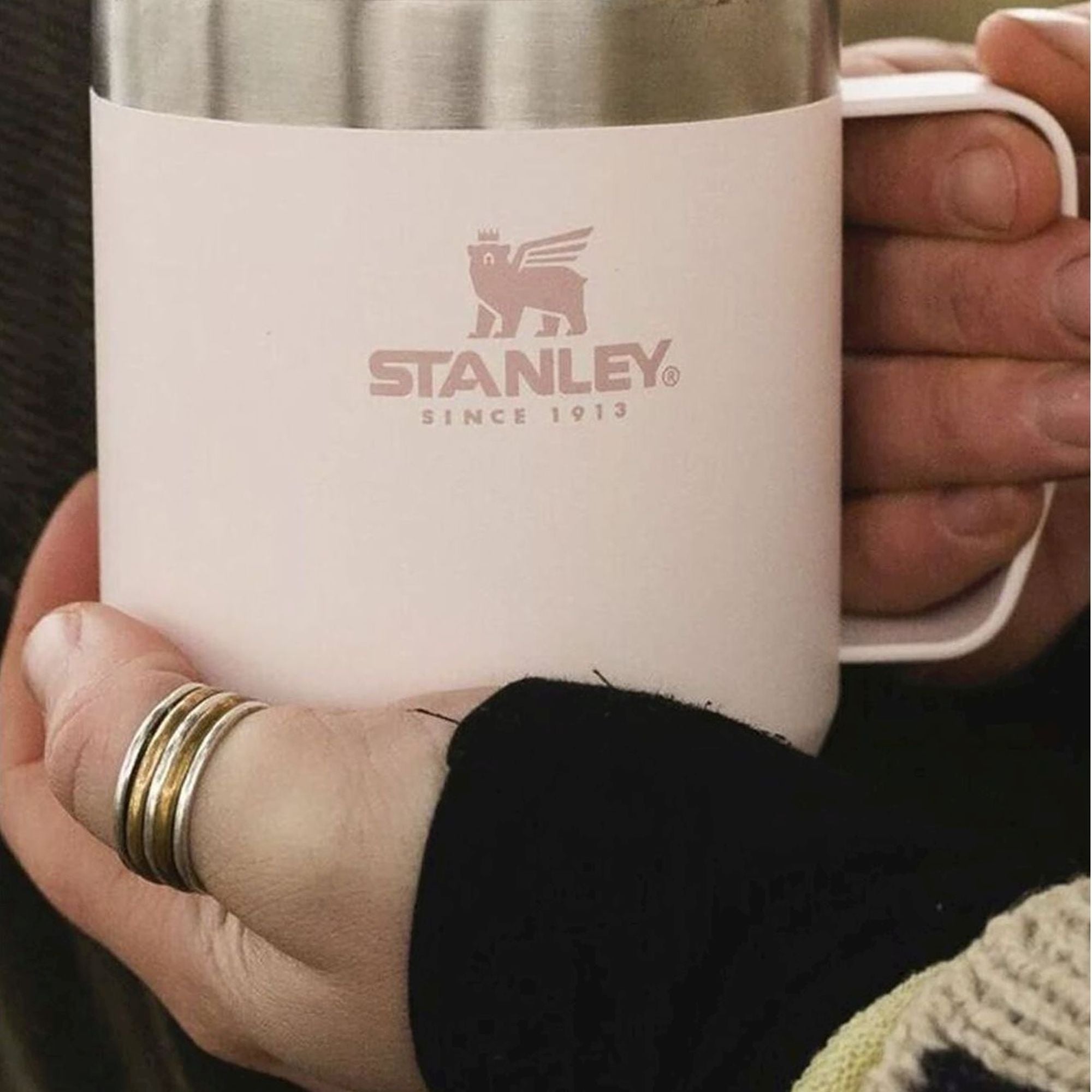Stanley Stay Hot Camp Mug 0.35L, a stainless steel travel mug with a handle and insulated design for hot beverages.