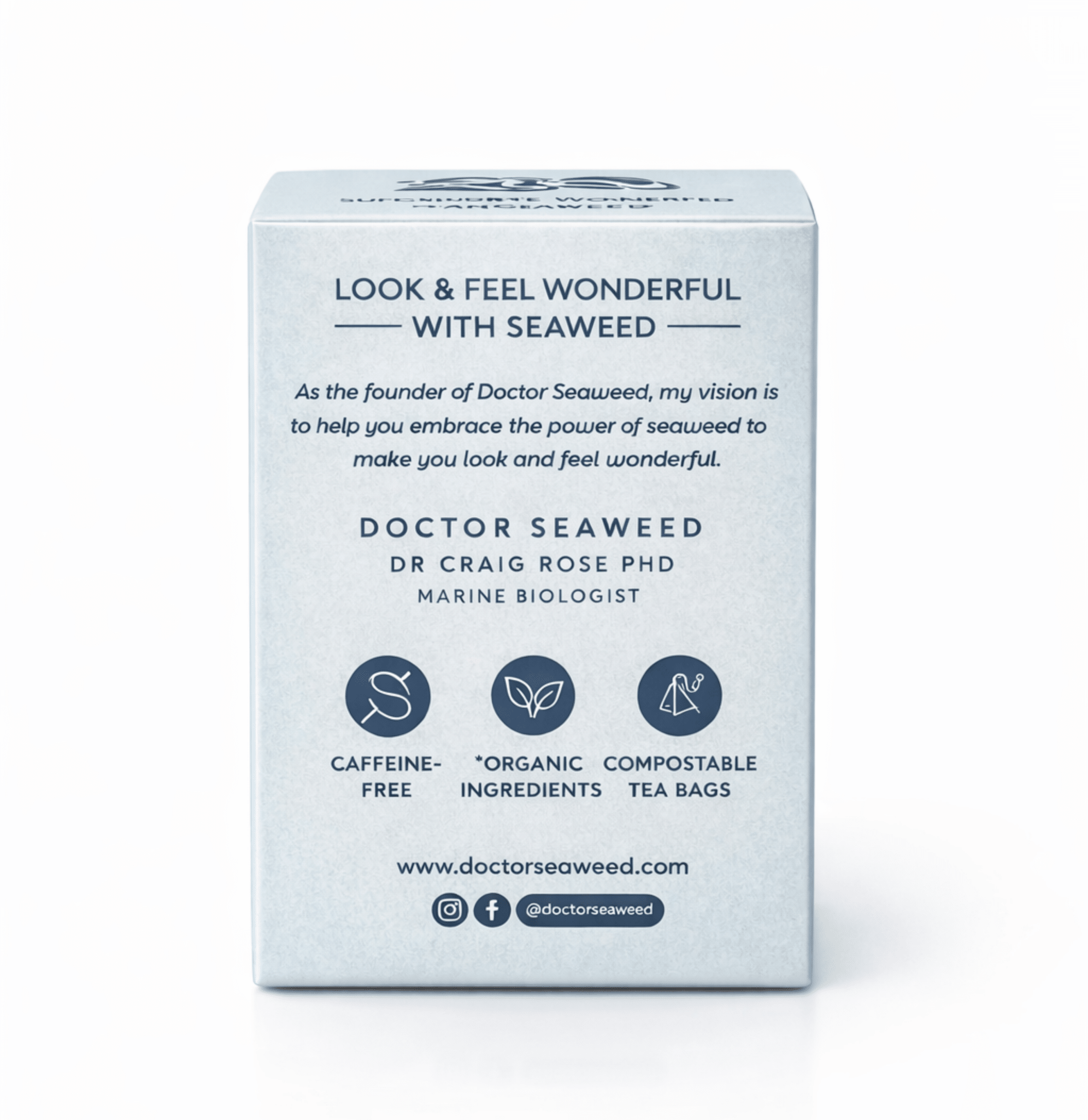 A cup of Serene Blend+ Tea by Doctor Seaweed with loose tea leaves and a teapot on a wooden table.