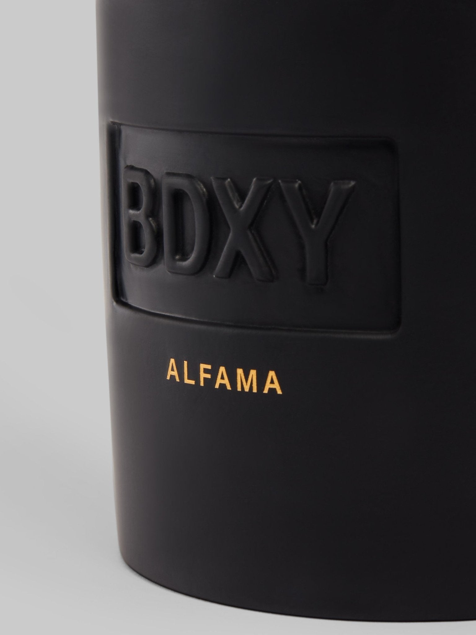 BDXY Studios Alfama scented candle with a simple glass jar and warm, inviting wax, designed for aromatic home ambiance.