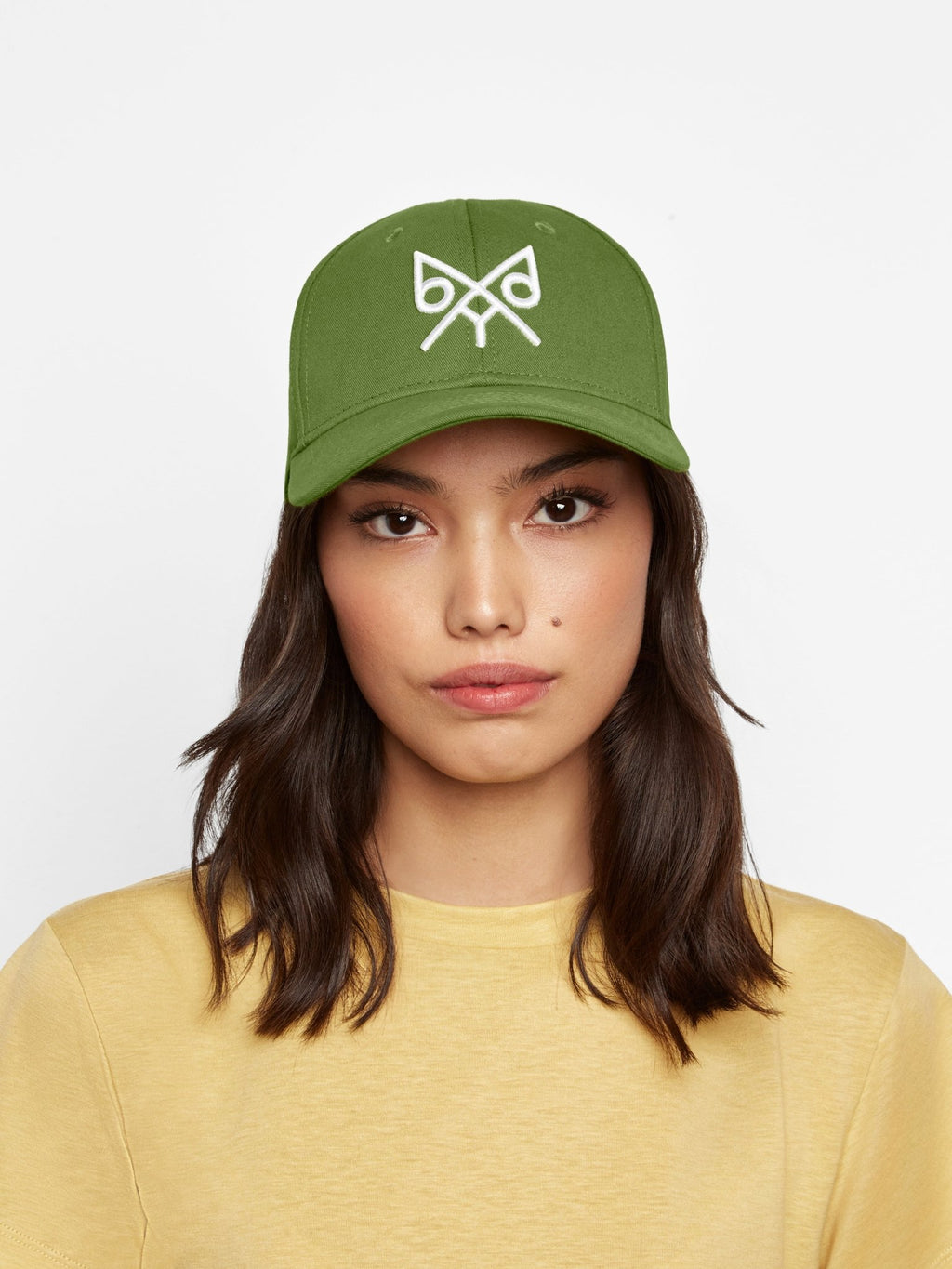 Oregon Green "The Focus" baseball cap by BDXY Studios, showing front view with adjustable strap and curved brim.