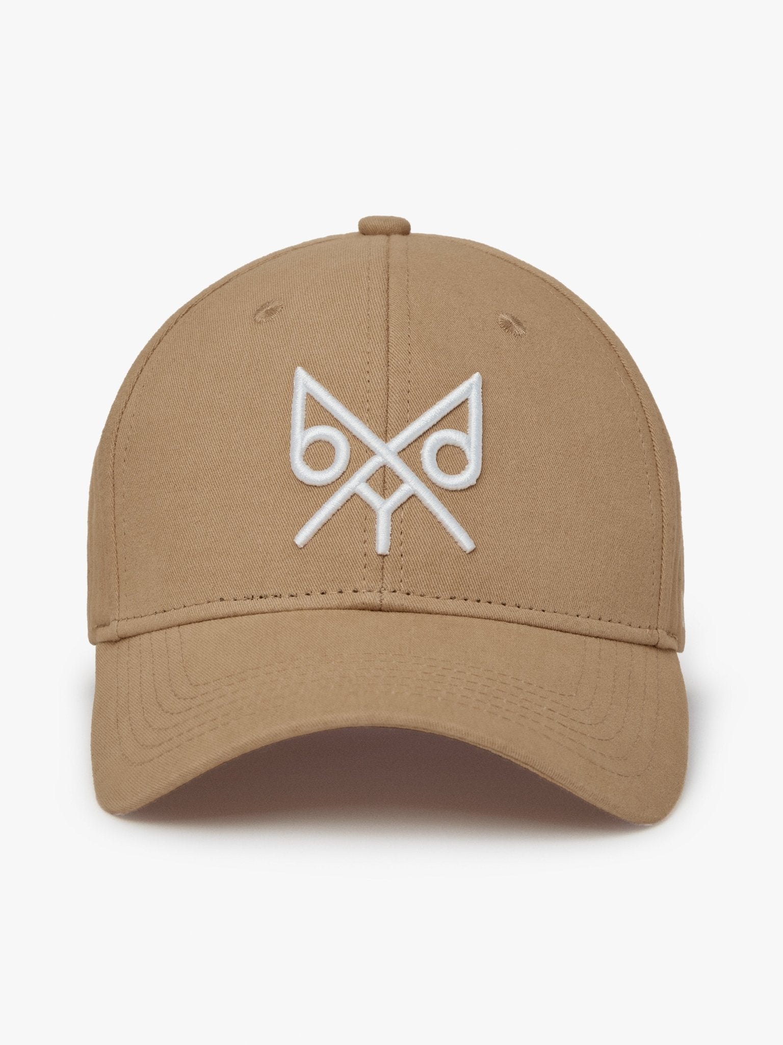 Tan baseball cap from BDXY Studios' The Focus collection, featuring a classic cap design with a curved brim and adjustable strap.