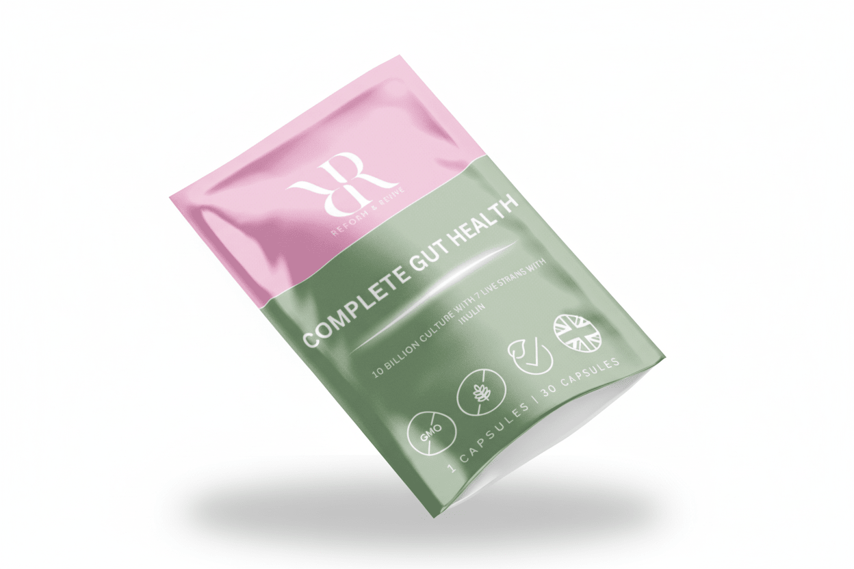 Reform and Revive Complete Gut Health+ wellness supplement bottle with label showing digestive and microbiome support features.
