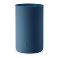 Navy blue silicone sleeve for 20 fl oz bottles, designed by HYDY, shown fitted over a beverage container in the image.