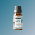 Scandiscents Ocean Breeze fragrance oil bottle with blue label, showcasing the aromatic oil for home scenting.