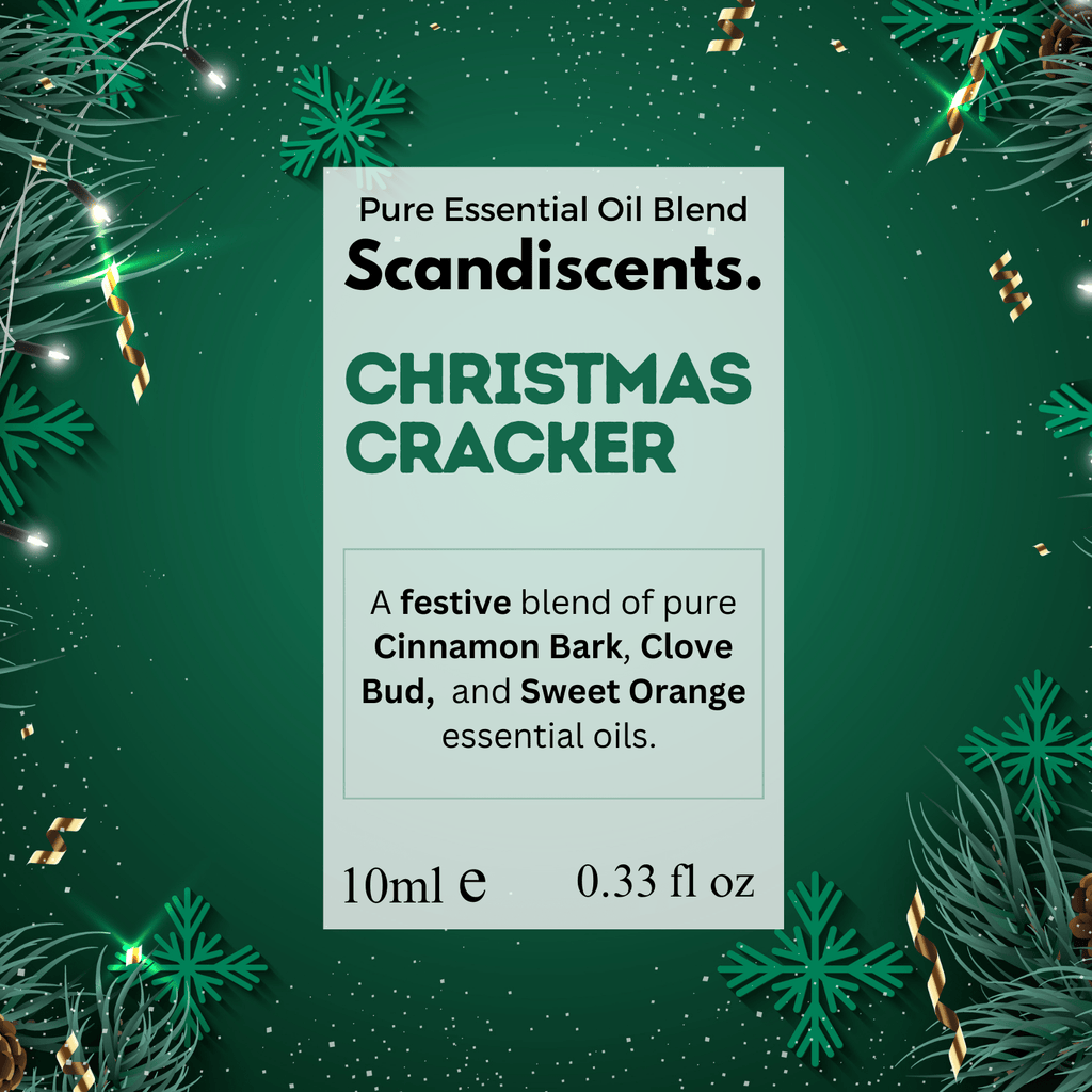 Two Christmas crackers featuring Scandiscents Essential Oil Blend labels, decorated with festive red and gold accents.