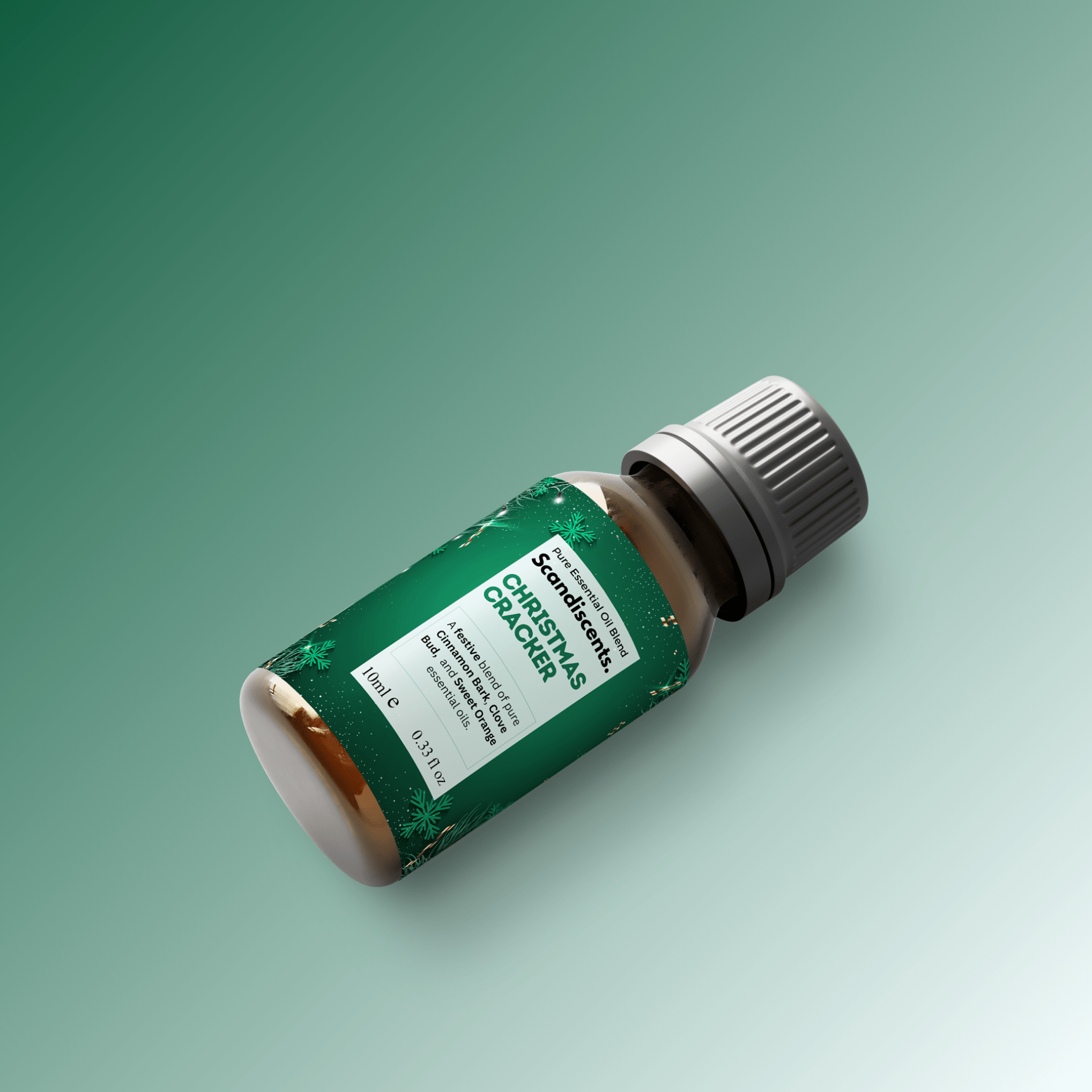 Christmas Cracker essential oil blend from Scandiscents, featuring a festive container with a colorful label and holiday-themed design.
