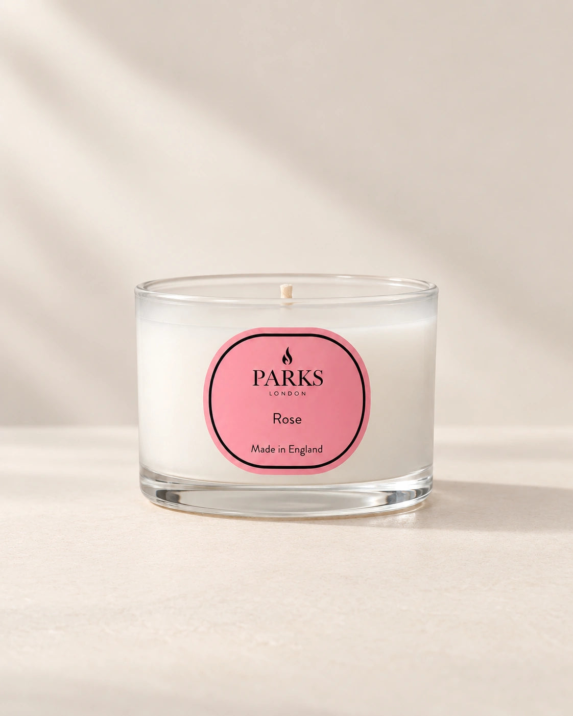 Parks Candles Rose Travel Candle 70g in a compact glass jar with a soft pink rose design