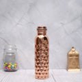 100% pure copper water bottle with heavy brick hammered honeycomb design, 950ml capacity, by SAMA Homes.