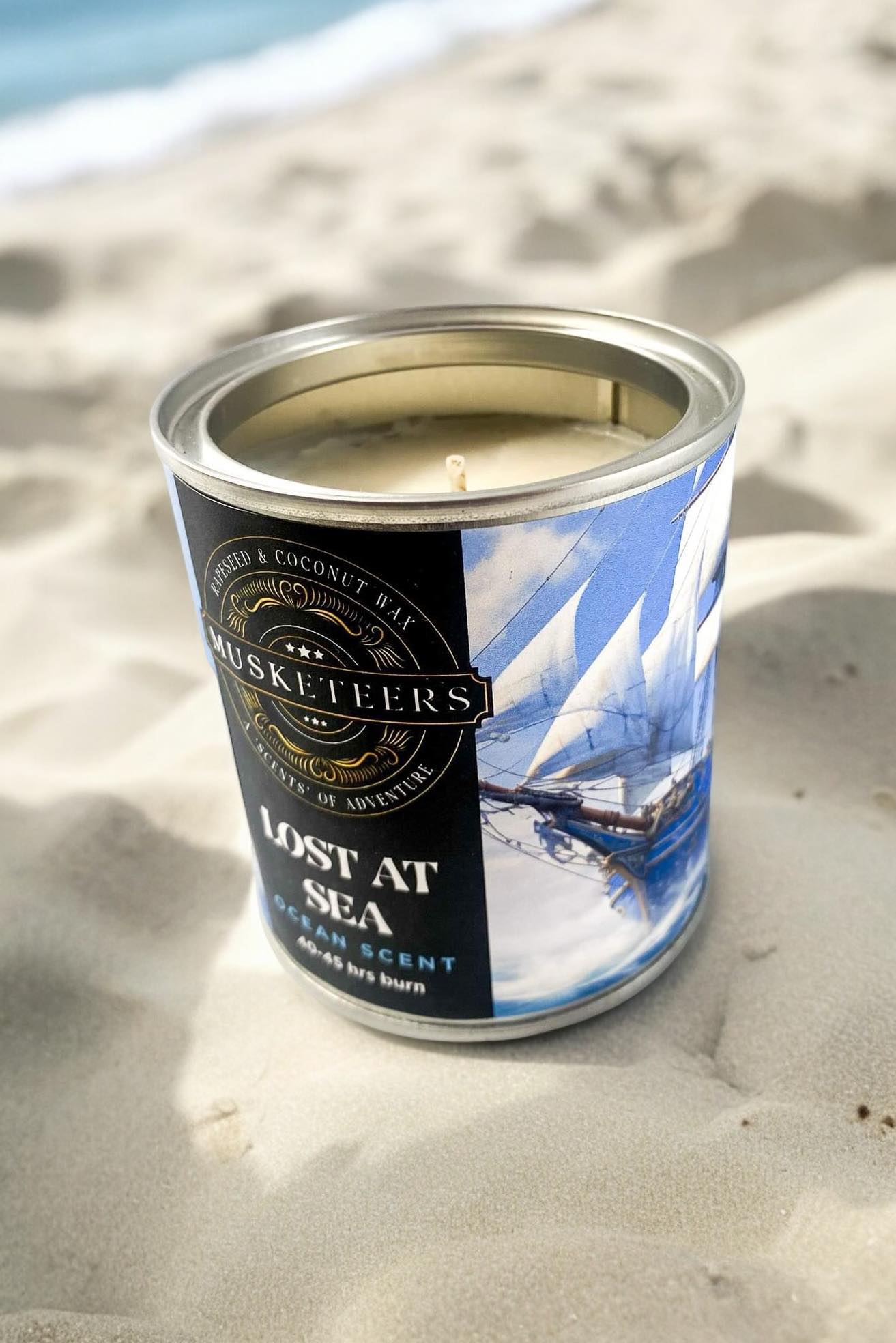 Musketeers Lost at Sea ocean and sea salt scented candle with fresh masculine coastal fragrance, perfect for a relaxing ambiance.