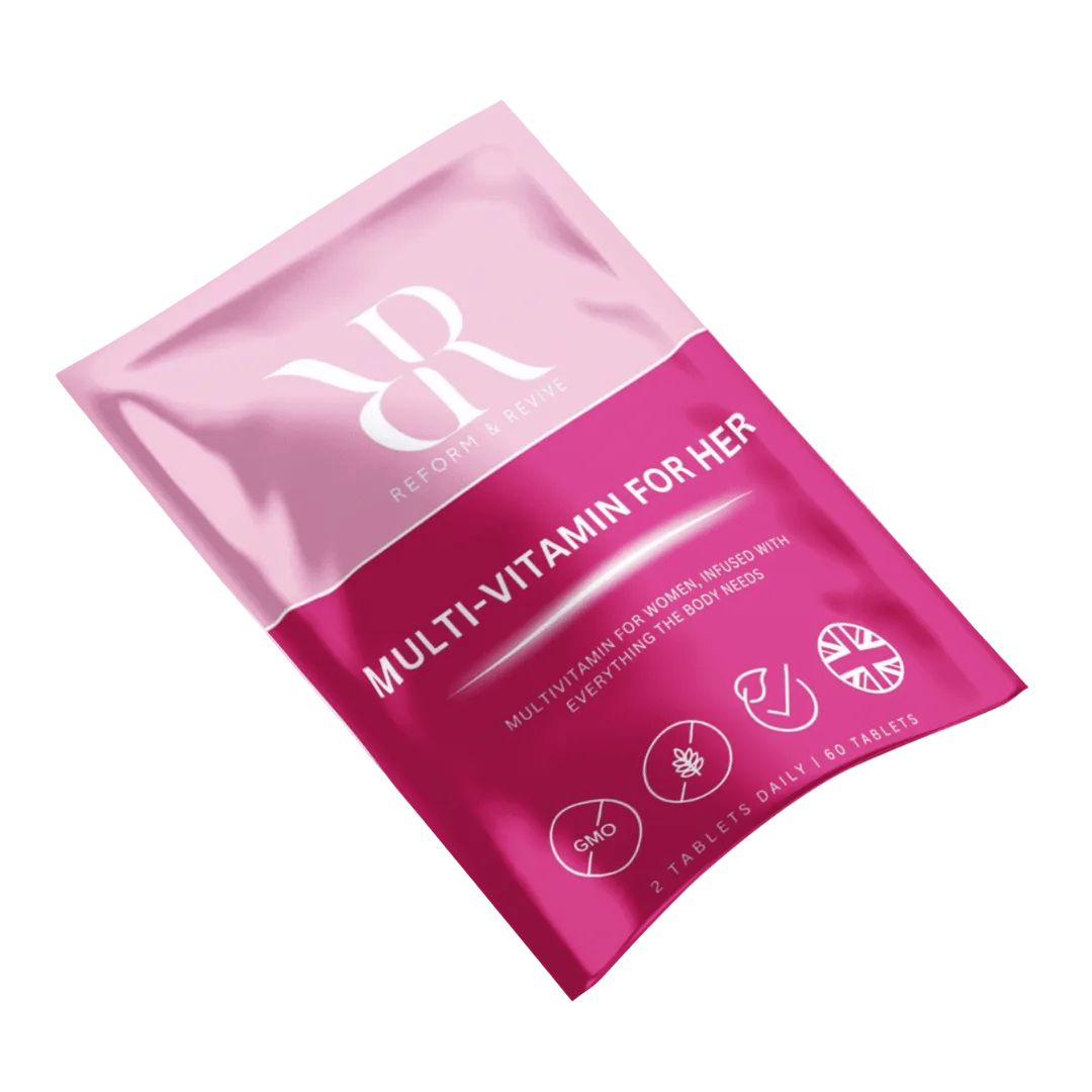 Reform and Revive Women’s Daily Multi+ vitamins bottle with colorful label and capsules visible inside.
