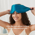 Black silk sleep mask by DREAMSILK, designed for complete blackout and gentle comfort during sleep.