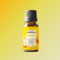 Scandiscents lemon essential oil bottle, natural citrus aroma, used for energy and uplifting mood, with a yellow label and clear glass bottle.