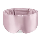 Black silk sleep mask by DREAMSILK, featuring a soft, smooth design for comfortable, complete blackout sleep.