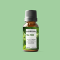 Scandiscents Tea Tree Essential Oil bottle and dropper on a white background, showcasing the natural herbal product.