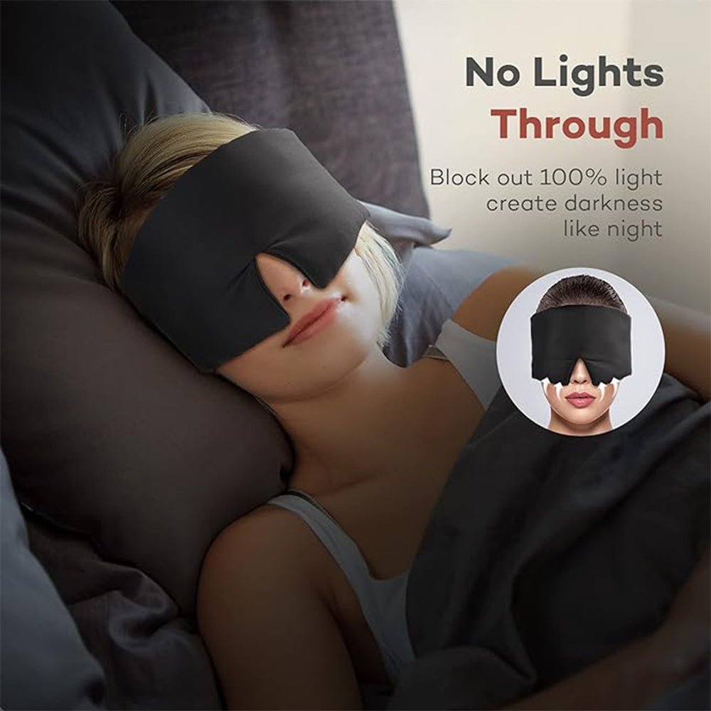 Black silk sleep mask by DREAMSILK, soft and smooth eye mask for nighttime light blocking and restful sleep.