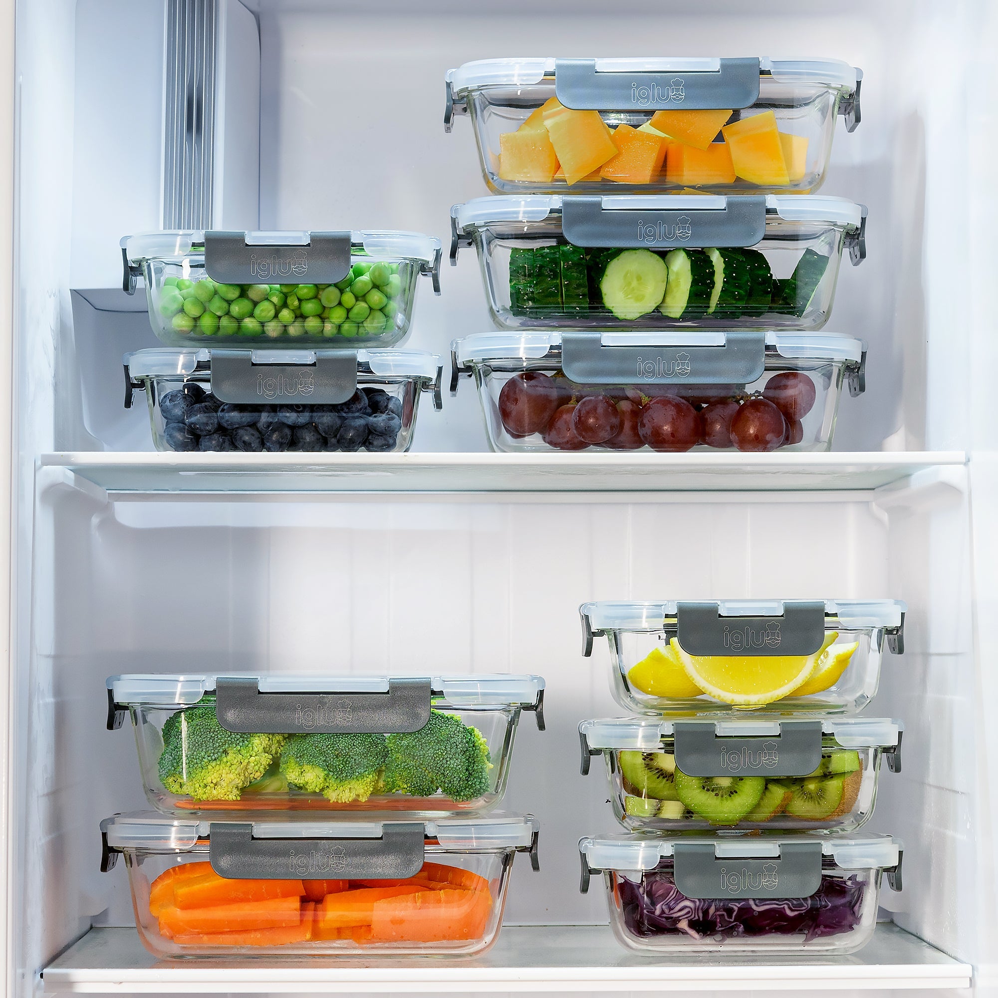 Set of six Igluu Meal Prep glass food storage containers in 1050ml and 370ml sizes, stacked with lids on.
