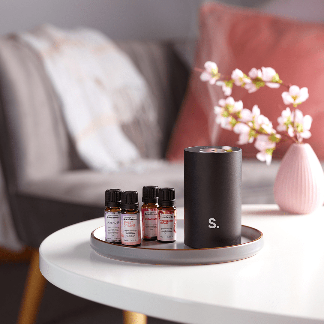 Scandiscents Halo Home Diffuser with sleek black design, waterless scented oil diffuser for aromatic home fragrance.