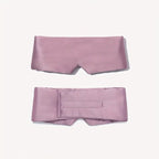 DREAMSILK blackout silk sleep mask covering eyes with smooth, luxurious black silk for restful sleep and eye comfort.
