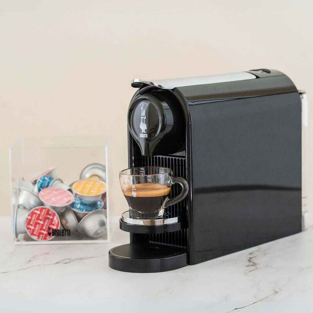 Bialetti Gioia Plus coffee maker by Brew Italia, black stovetop espresso pot with ergonomic handle and lid.