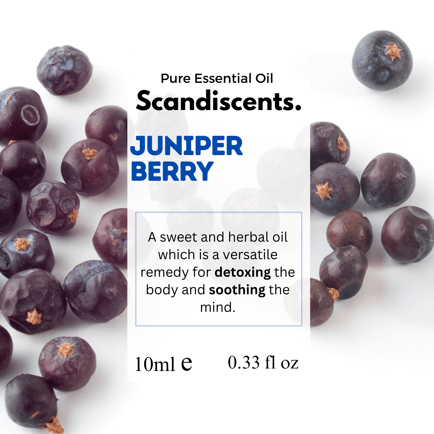 Scandiscents juniper berry essential oil bottle with a green label, surrounded by fresh juniper berries and green foliage.