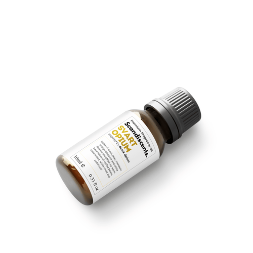 Scandiscents Black Opium-inspired fragrance oil bottle with black and gold packaging for luxurious scent.