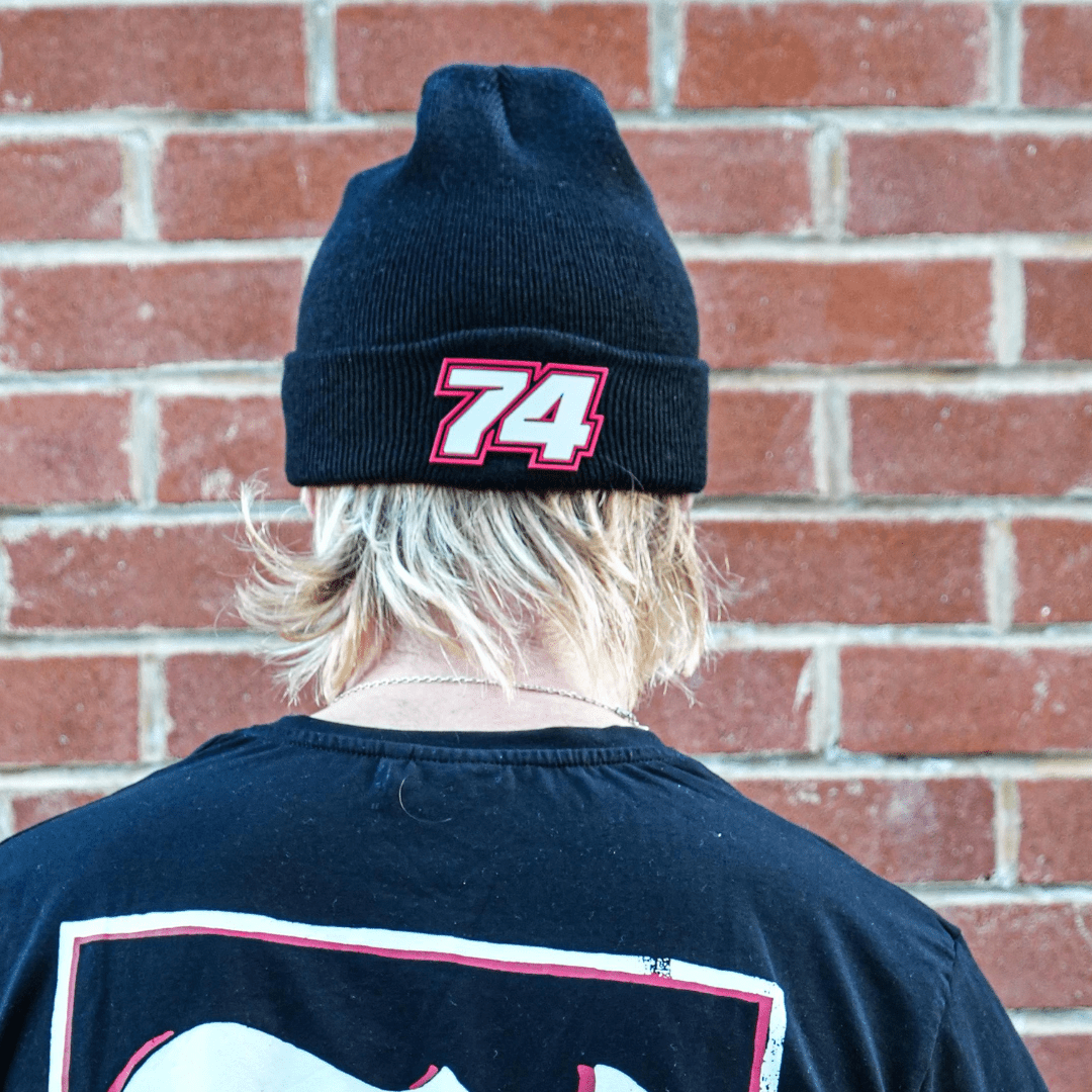 Uggly and Co Davey Todd 74 beanie in black with logo patch, soft knit fabric, snug fit, casual winter headwear.