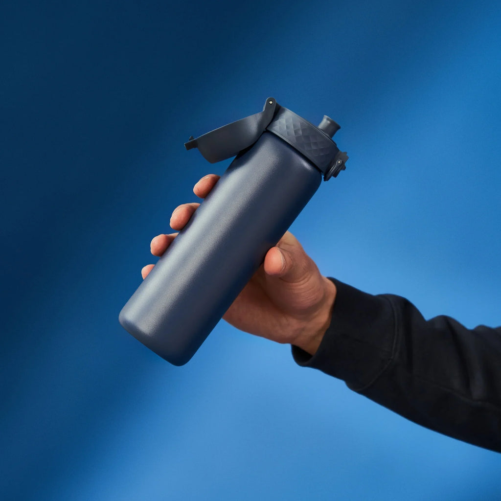 ION8 leak-proof slim thermal steel water bottle in ash navy, insulated 500ml (17oz) for hot or cold drinks.