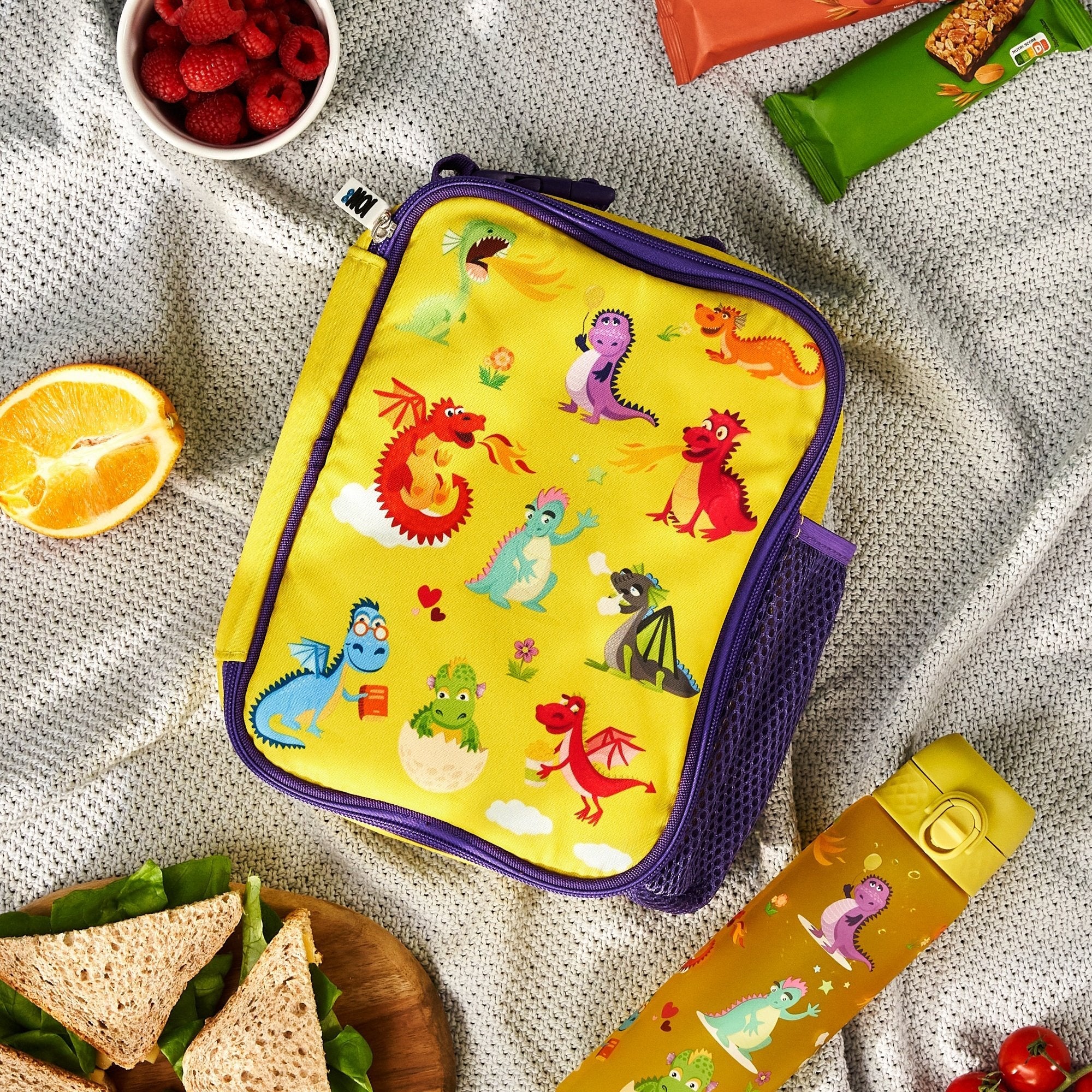 Kids insulated lunch bag with dragon design by ION8, medium size, featuring colorful dragon illustrations on the exterior.