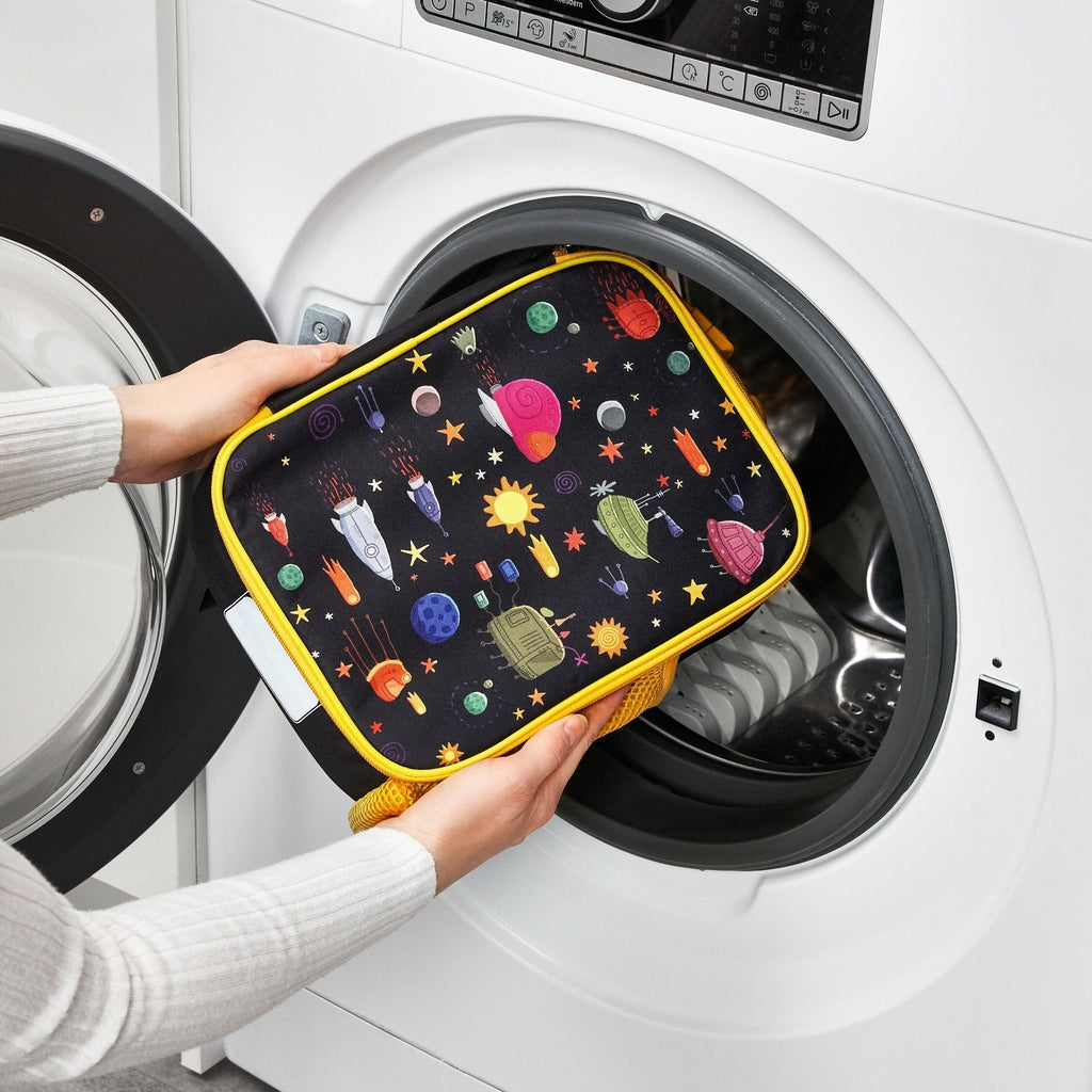 Insulated kids lunch bag with spaceship design from ION8, medium size, featuring vibrant space-themed graphics and adjustable shoulder strap.
