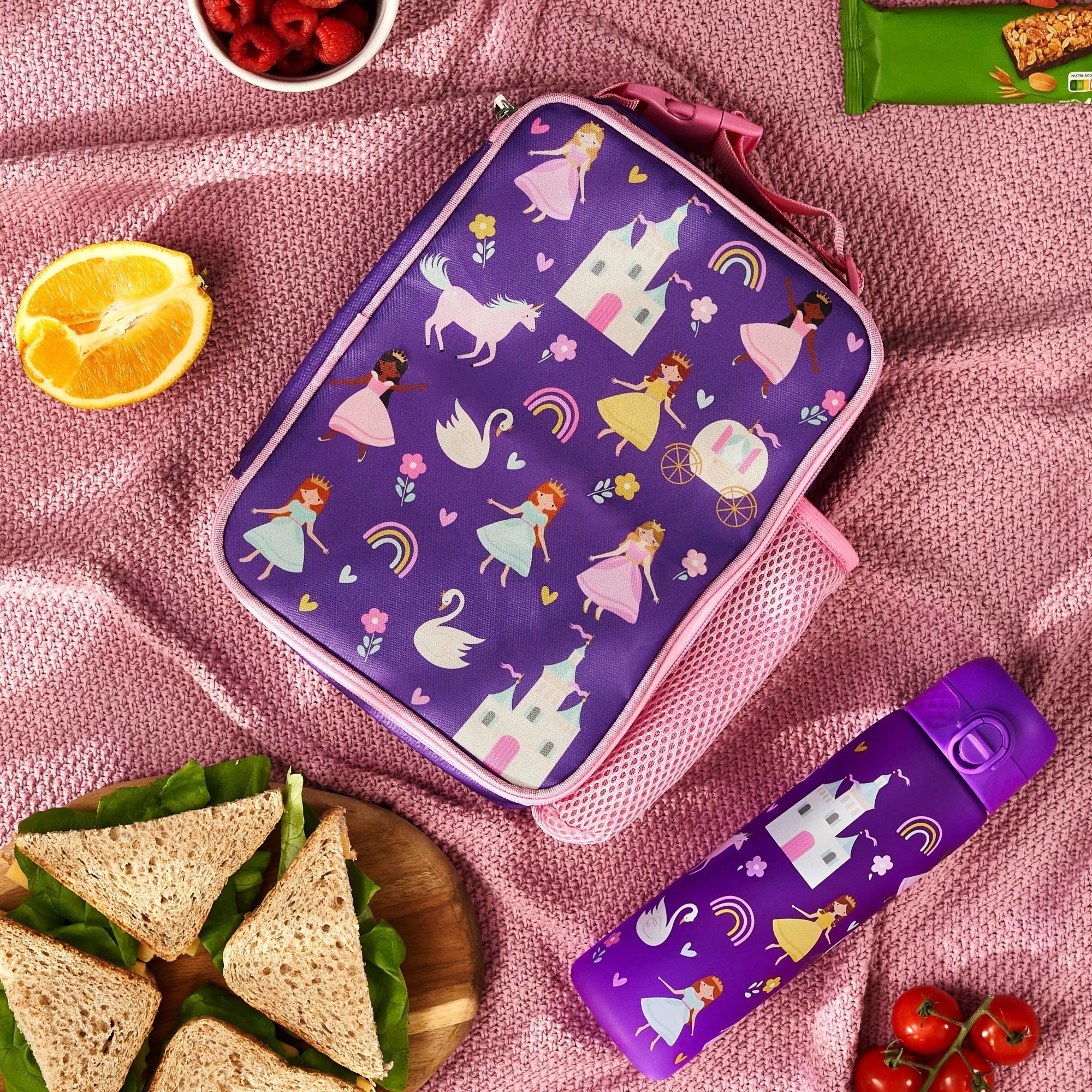 Insulated kids lunch bag with princess design from ION8, medium size, featuring colorful graphics and a secure zipper closure.