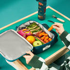 Insulated kids lunch bag with automobile print by ION8, medium size, featuring colorful car illustrations on a durable fabric.