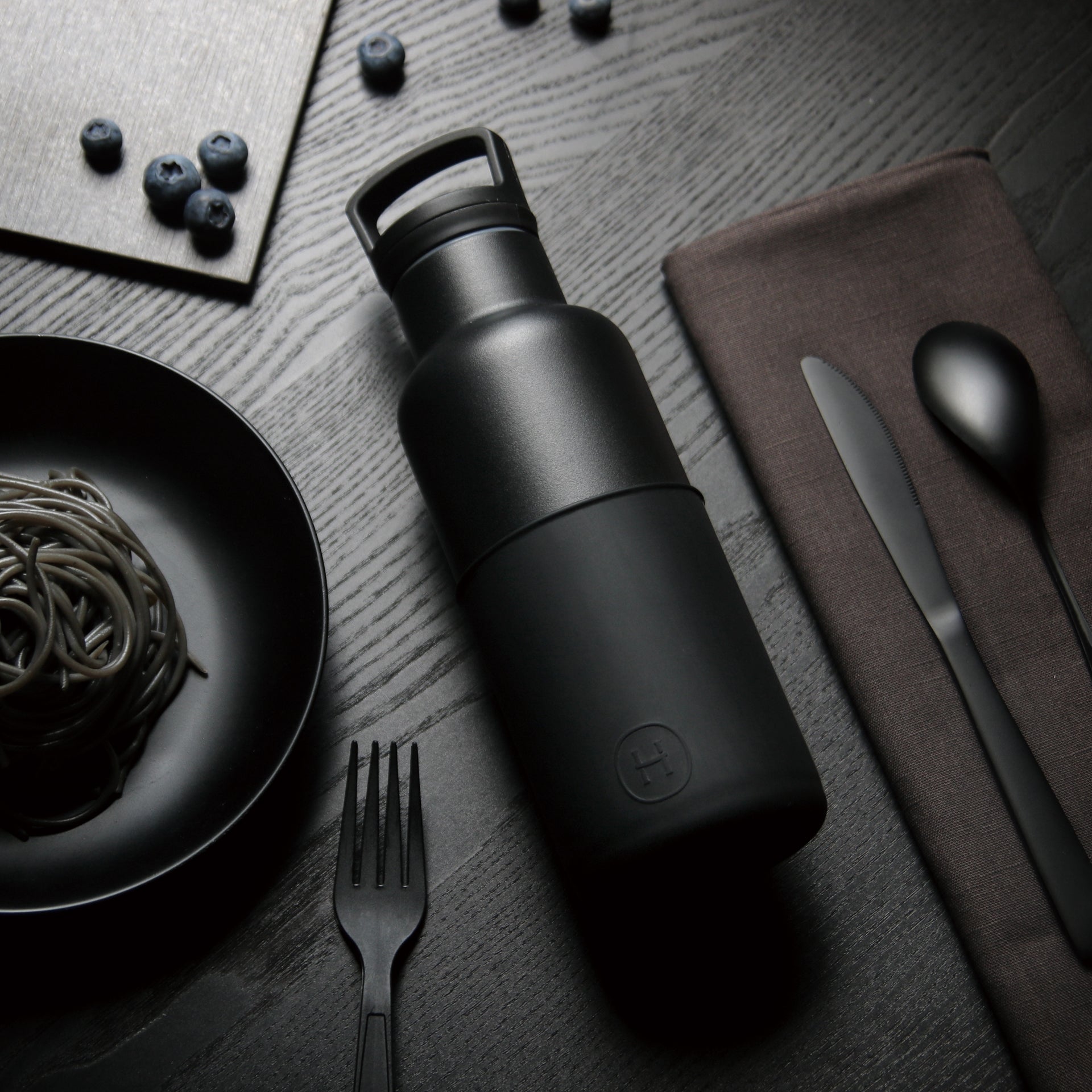 HYDY black ink bottle, 16 oz, in a clear plastic bottle with black ink visible inside, suitable for writing or artistic use.
