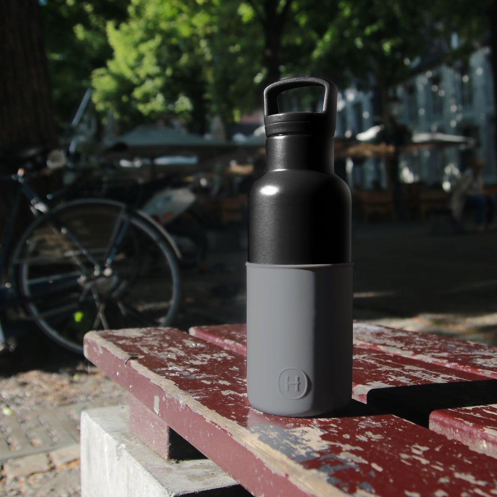Black metallic grey 16 oz HYDY bottle with a sleek design, featuring a sturdy cap and a smooth surface.