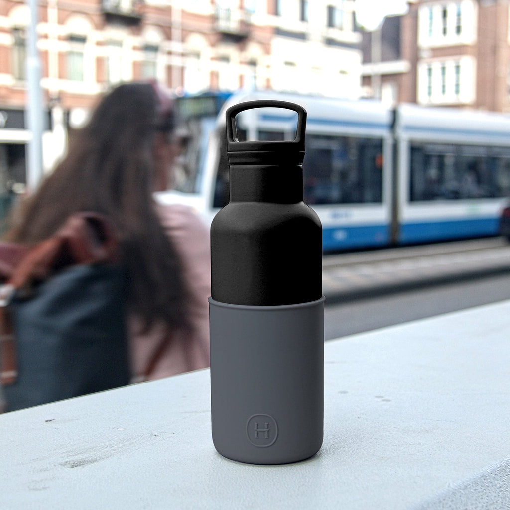 Black metallic grey 16 oz HYDY bottle with a sleek design and secure lid, perfect for hydration and on-the-go use.