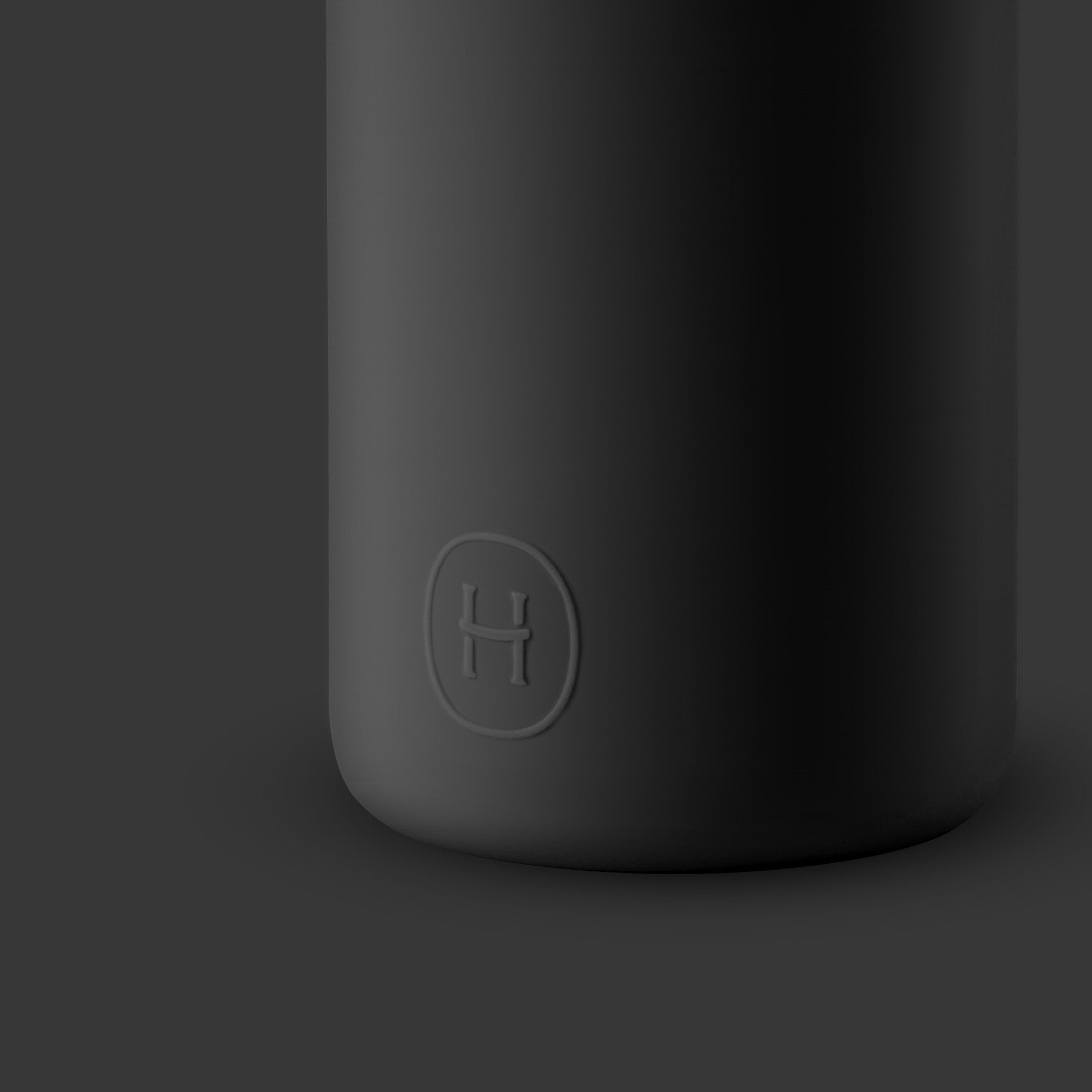 Black-Ink black 16 oz bottle by HYDY, with a sleek black label and cap, designed for ink or fluid storage.