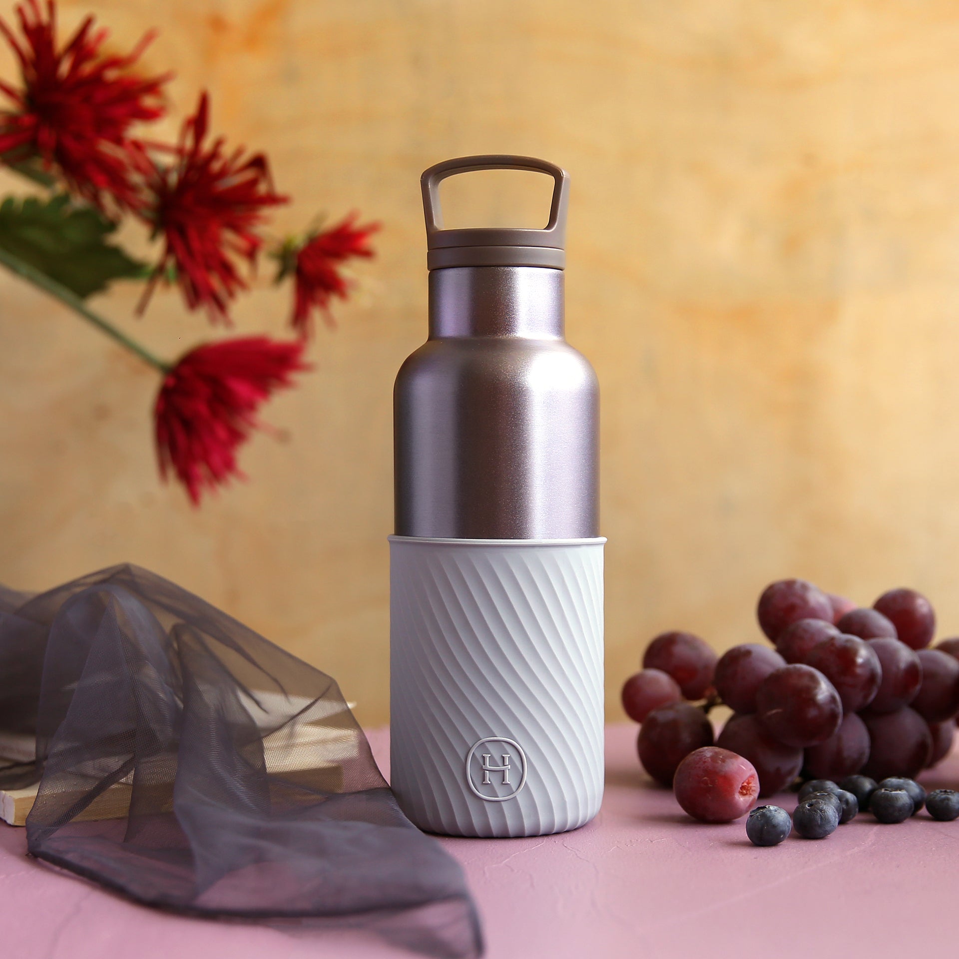 HYDY 16 oz dusk violet and cloudy grey bottle, sleek design with a modern, minimalist appearance.