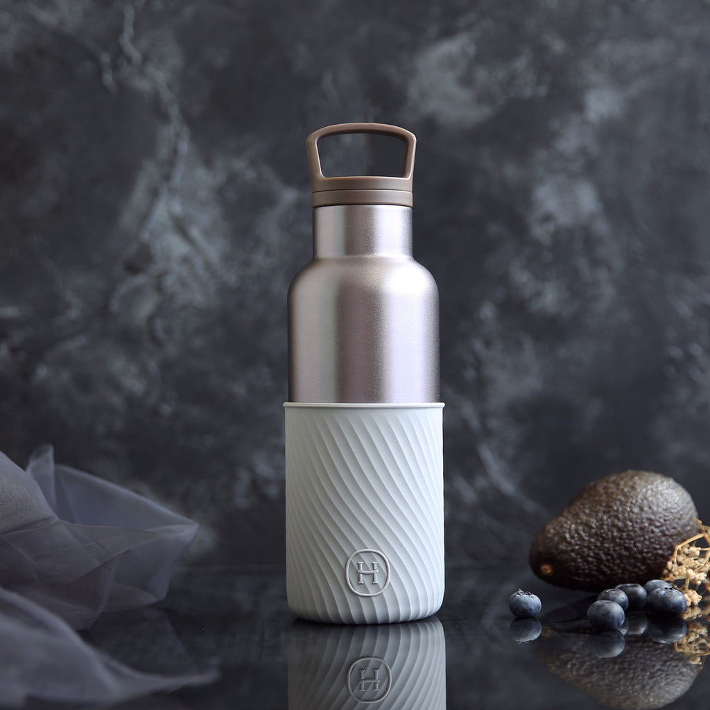 HYDY Dusk Violet and Cloudy Grey 16 oz bottle with a sleek, modern design and vibrant color accents.