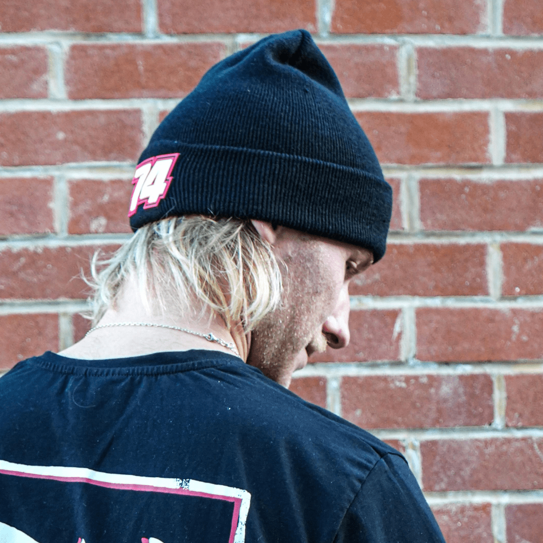 Uggly and Co Davey Todd 74 beanie in black, knitted fabric with a folded brim, stylish winter accessory.