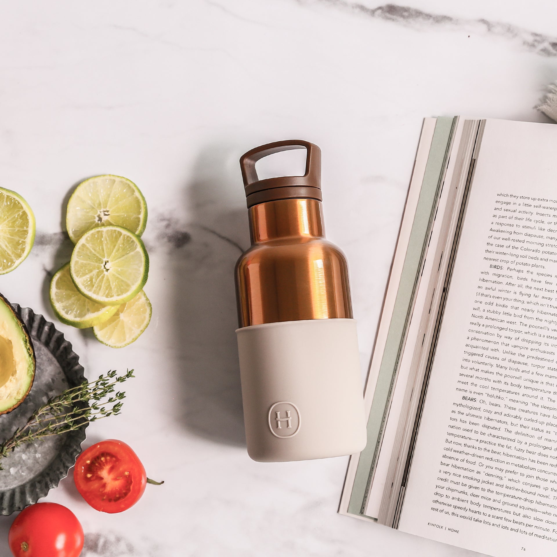 Bronze gold eucalyptus bottle by HYDY, 12 oz, featuring a sleek design with realistic eucalyptus leaf pattern on the bottle.