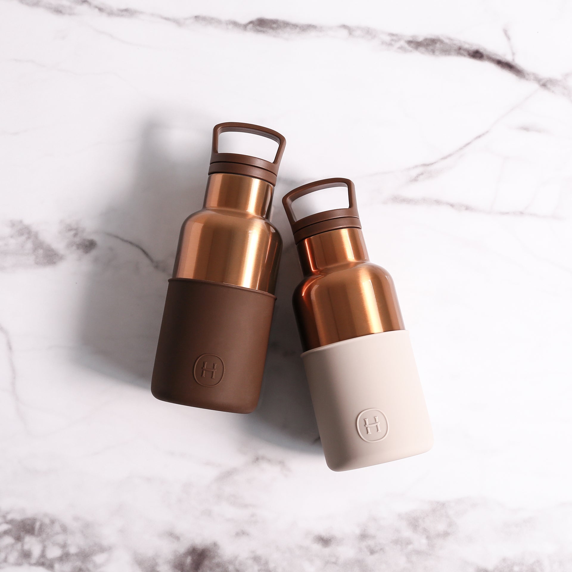 Bronze gold eucalyptus-scented 12 oz bottle by HYDY, featuring a sleek design with eucalyptus leaves on the label.