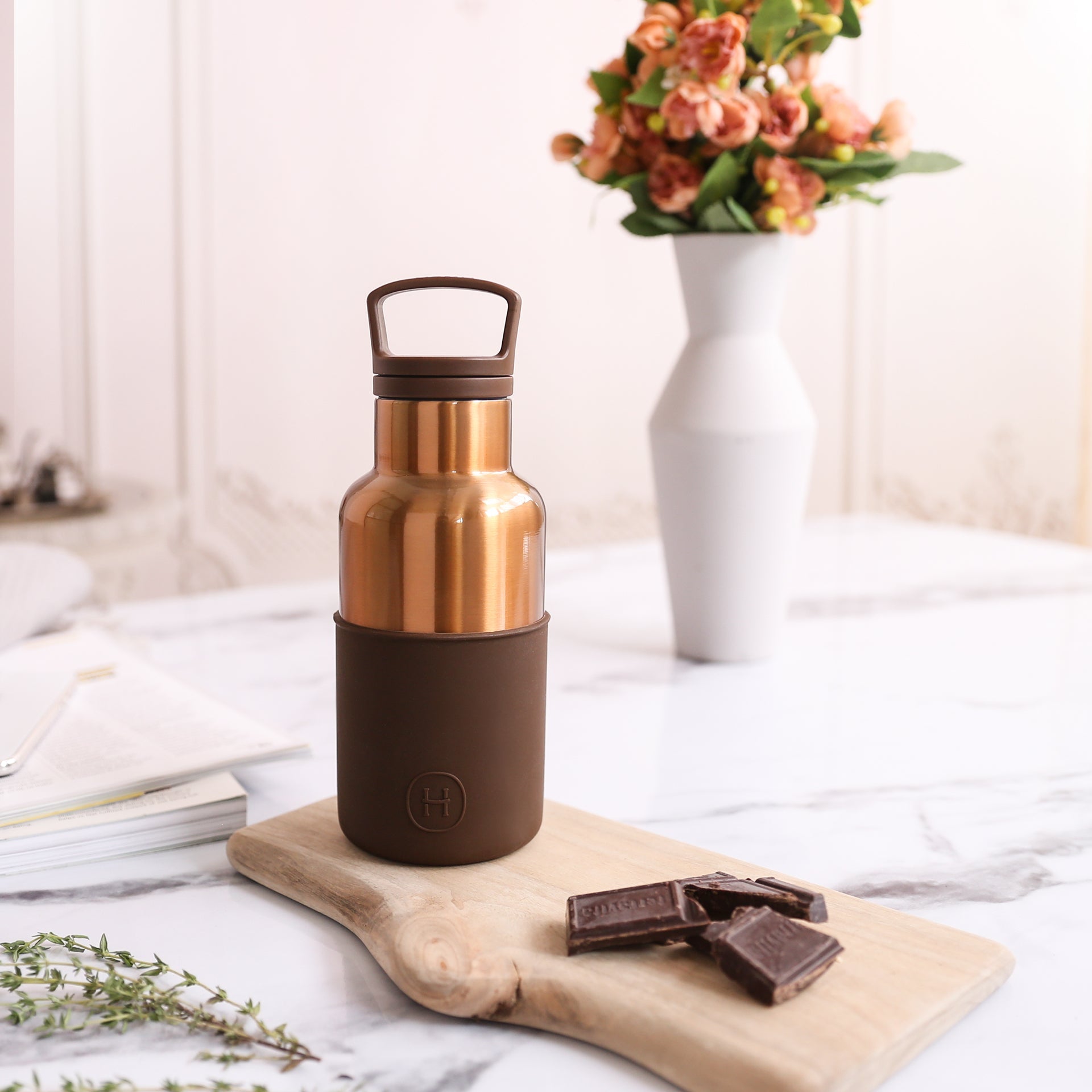 HYDY Bronze Gold-Mocha 12 oz bottle with a sleek design and metallic finish, perfect for stylish hydration.