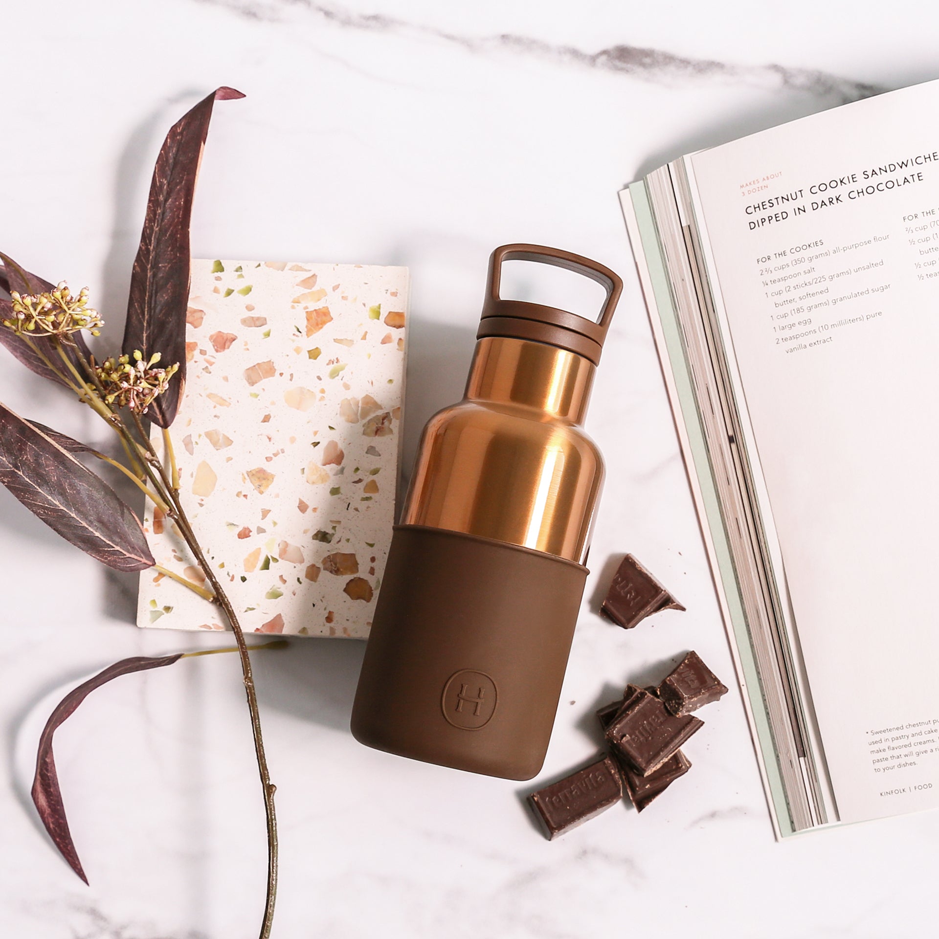 HYDY Bronze Gold-Mocha 12 oz bottle with a sleek design and metallic bronze gold finish, ideal for stylish hydration.