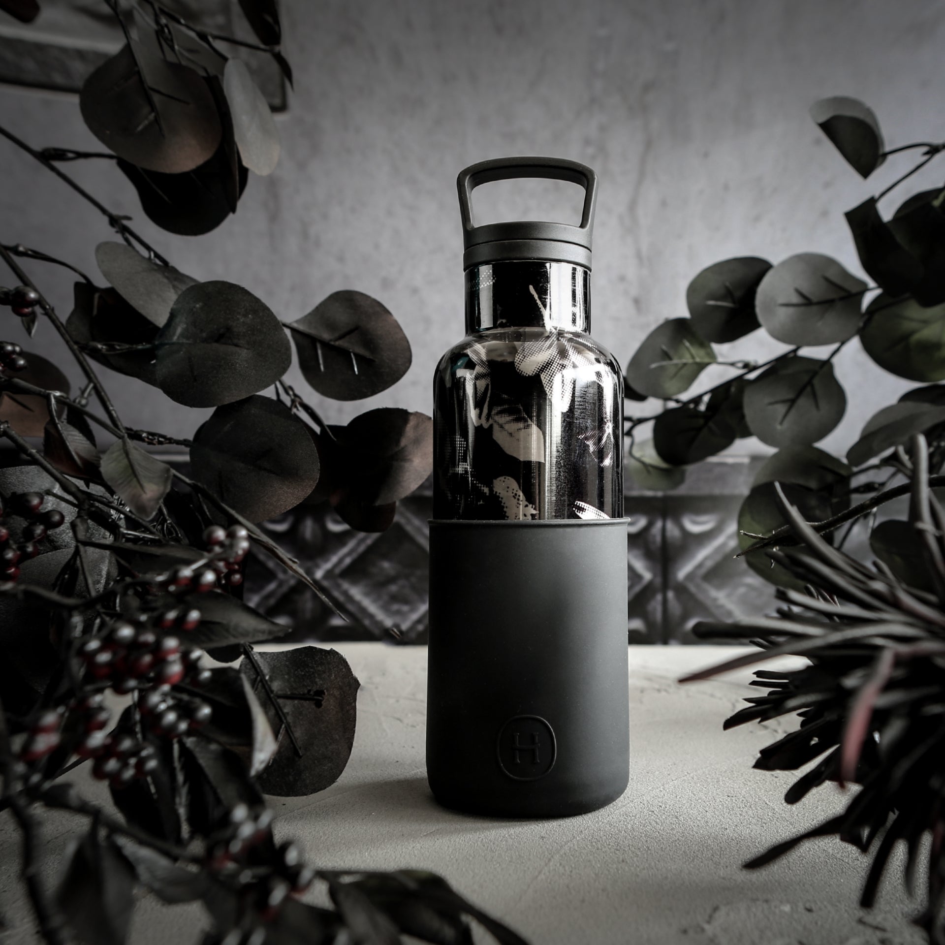 Black halftone-ink bottle by HYDY, 16 oz, showing the dark ink inside and the clear plastic bottle with label.