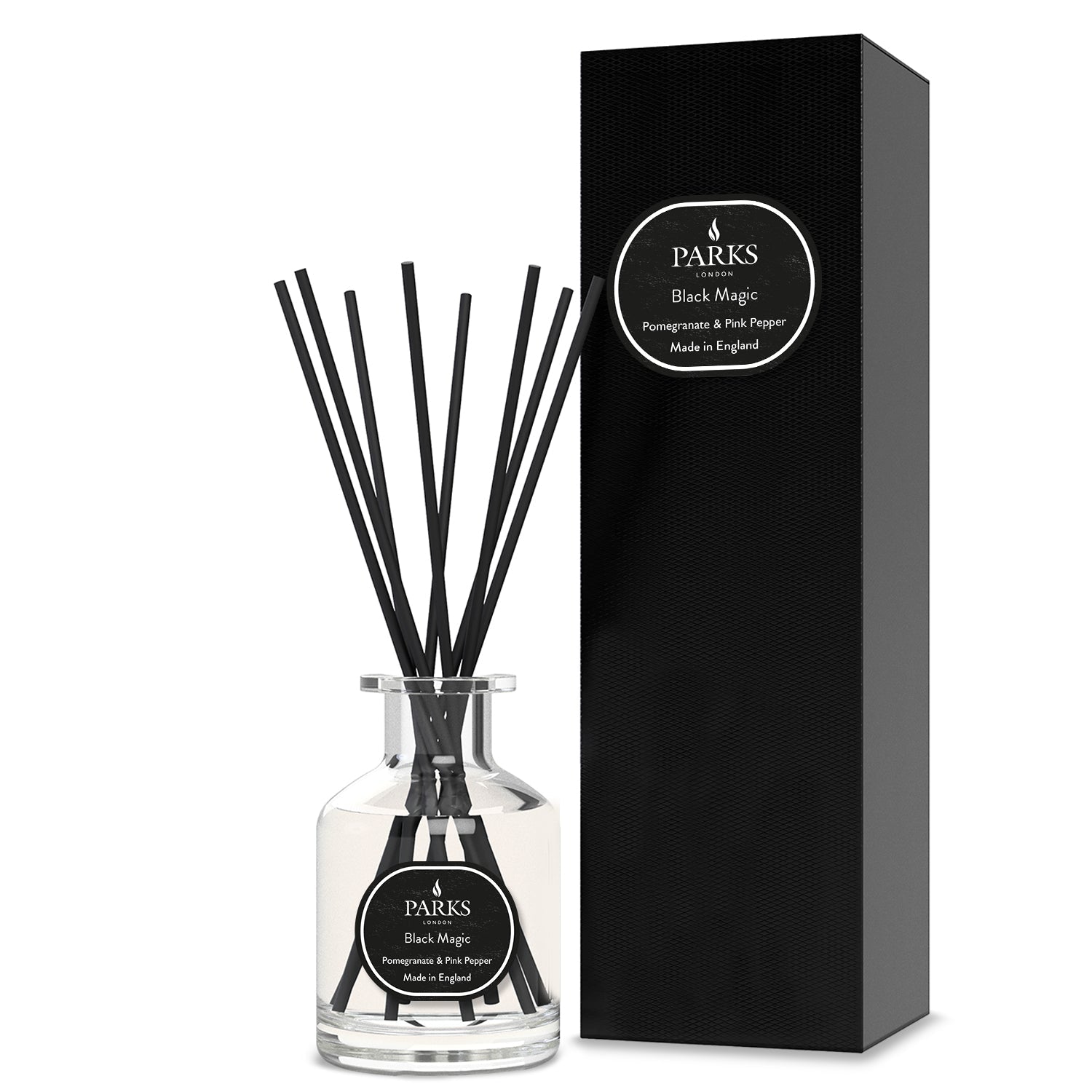 Parks Candles Pomegranate & Pink Pepper reed diffuser with a glass bottle and reed sticks for home fragrance.