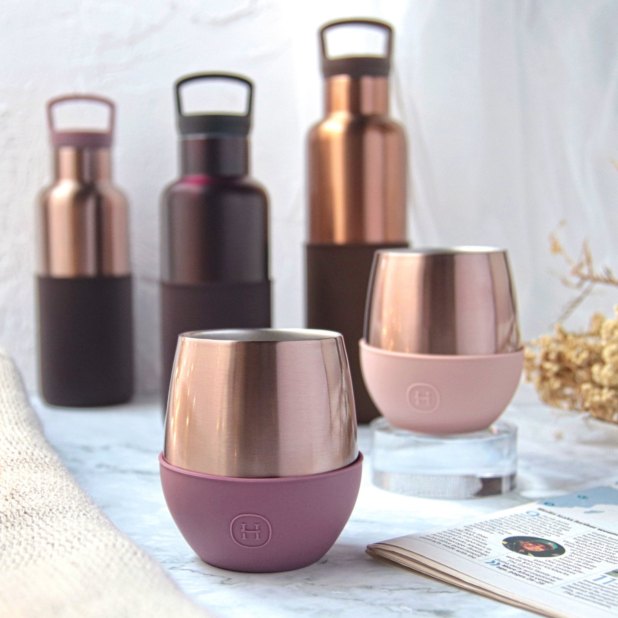 Pink gold 8 oz tumbler in dusty rose color by HYDY, featuring a sleek, modern design perfect for hot or cold drinks.