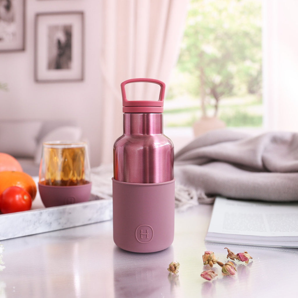 HYDY Rose Gold-Dusty Rose 12 oz bottle with metallic finish and elegant design, showcasing the product label and bottle shape.