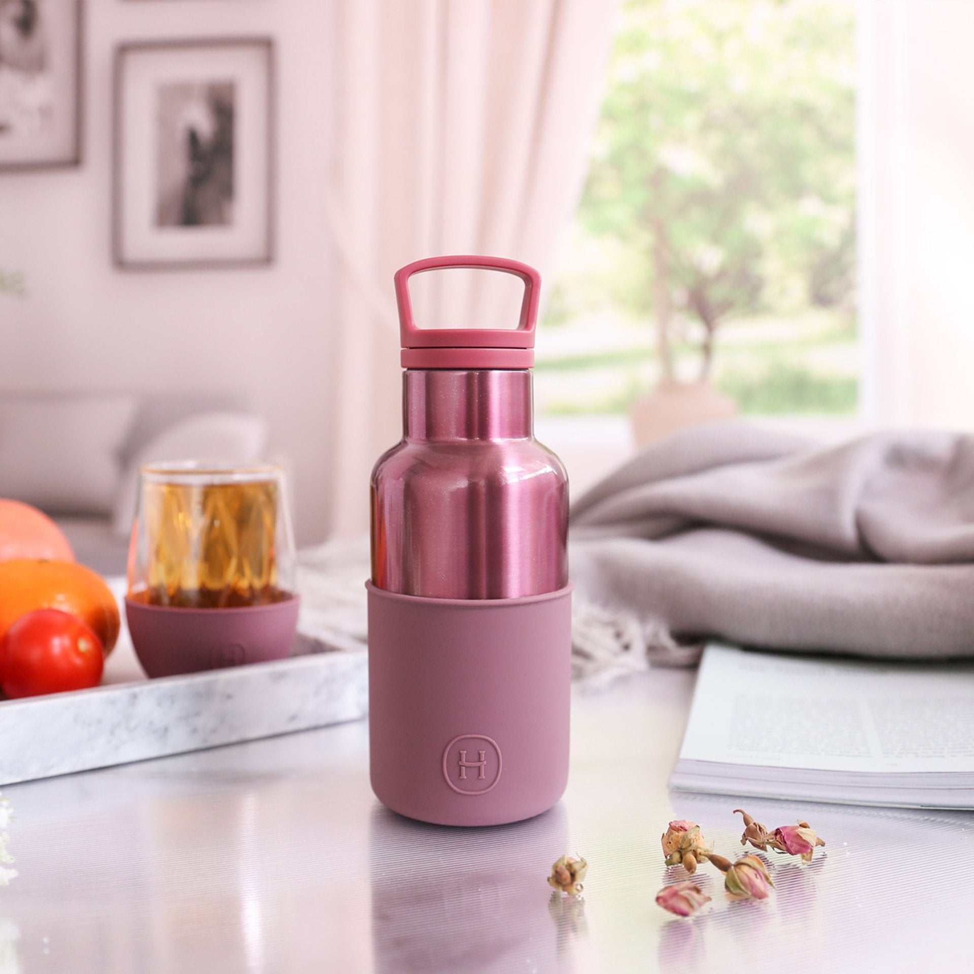 HYDY Rose Gold-Dusty Rose 12 oz bottle with metallic finish and elegant design, showcasing the product label and bottle shape.